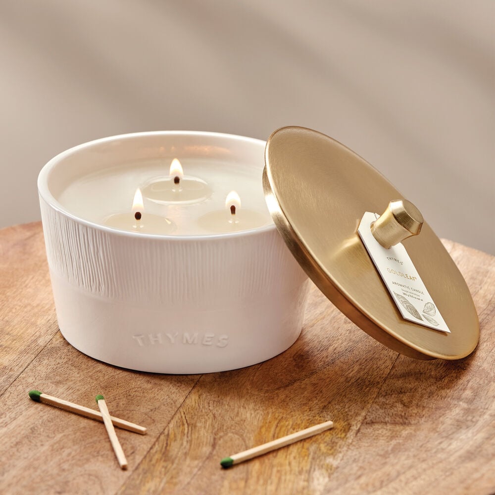 Thymes Goldleaf 3-Wick Candle on table image number 4